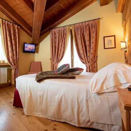 Laghetto Alpine Hotel & Restaurant Брюссон Экстерьер фото