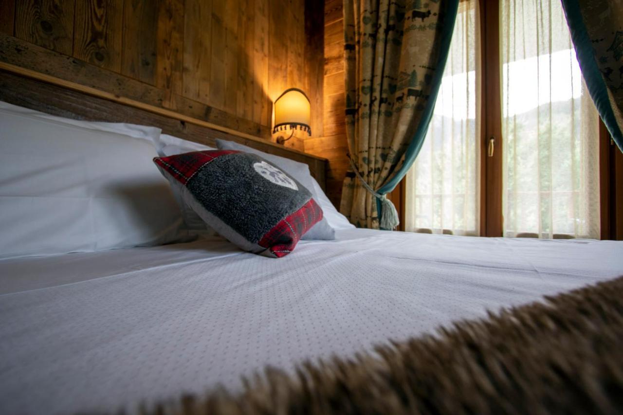 Laghetto Alpine Hotel & Restaurant Брюссон Экстерьер фото