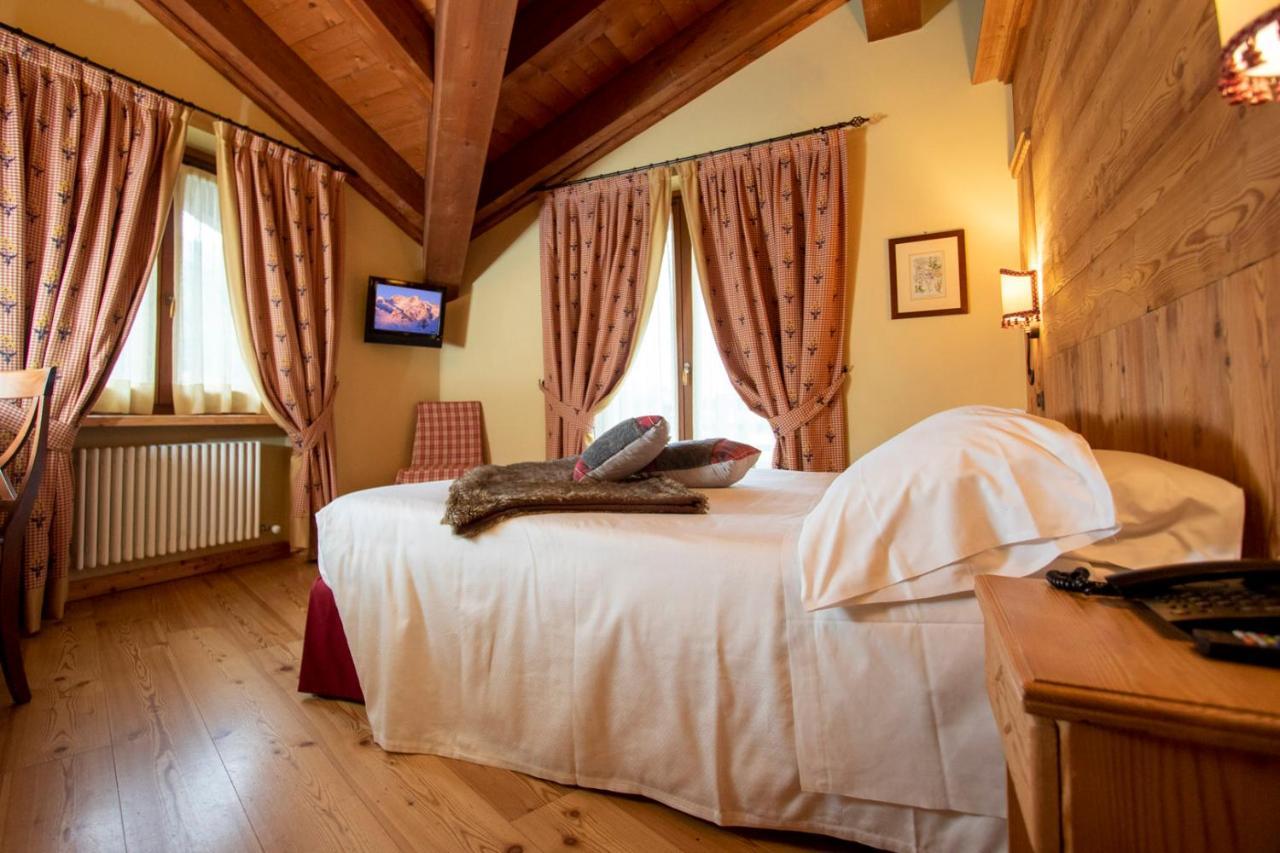 Laghetto Alpine Hotel & Restaurant Брюссон Экстерьер фото