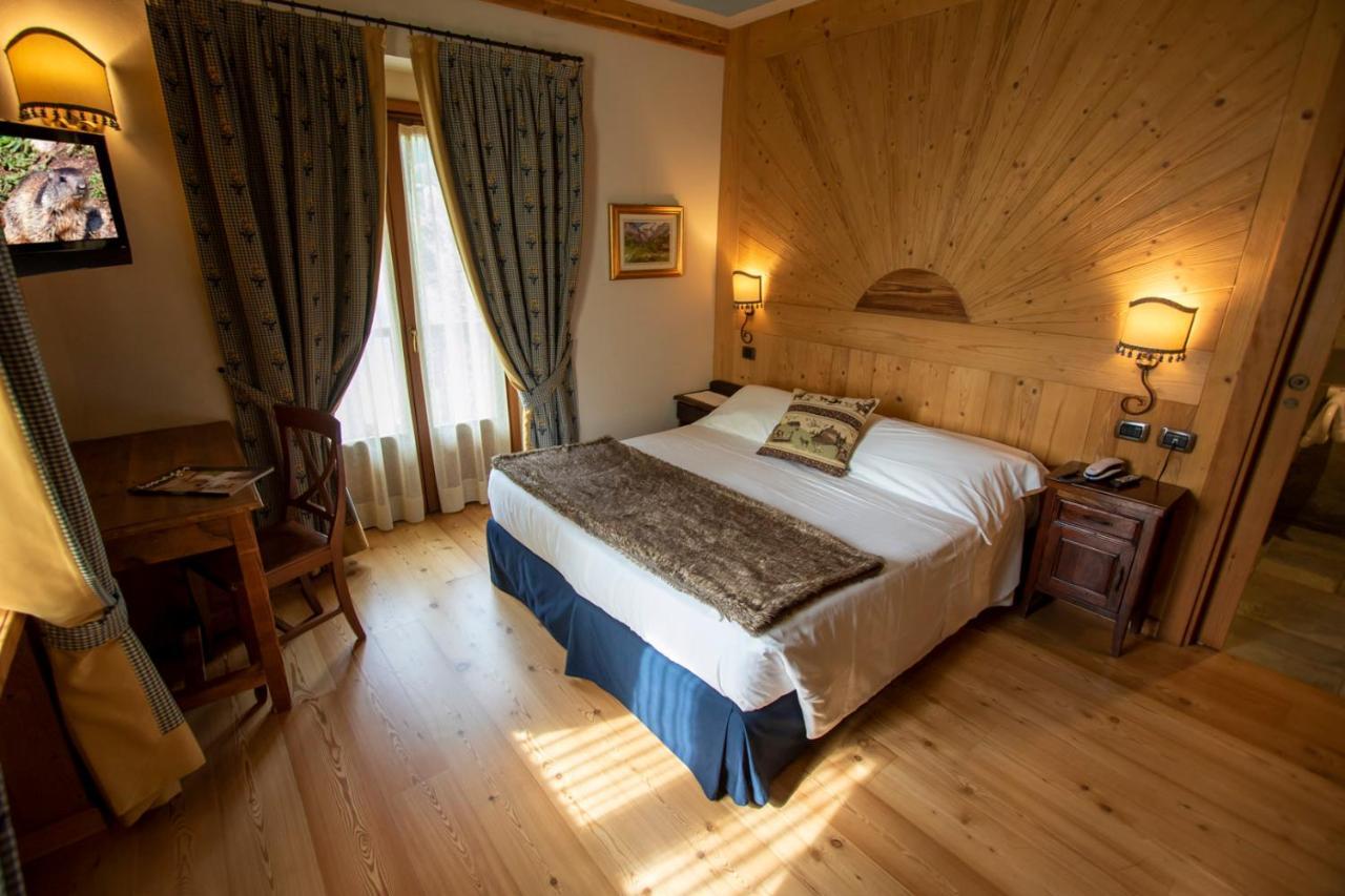 Laghetto Alpine Hotel & Restaurant Брюссон Экстерьер фото