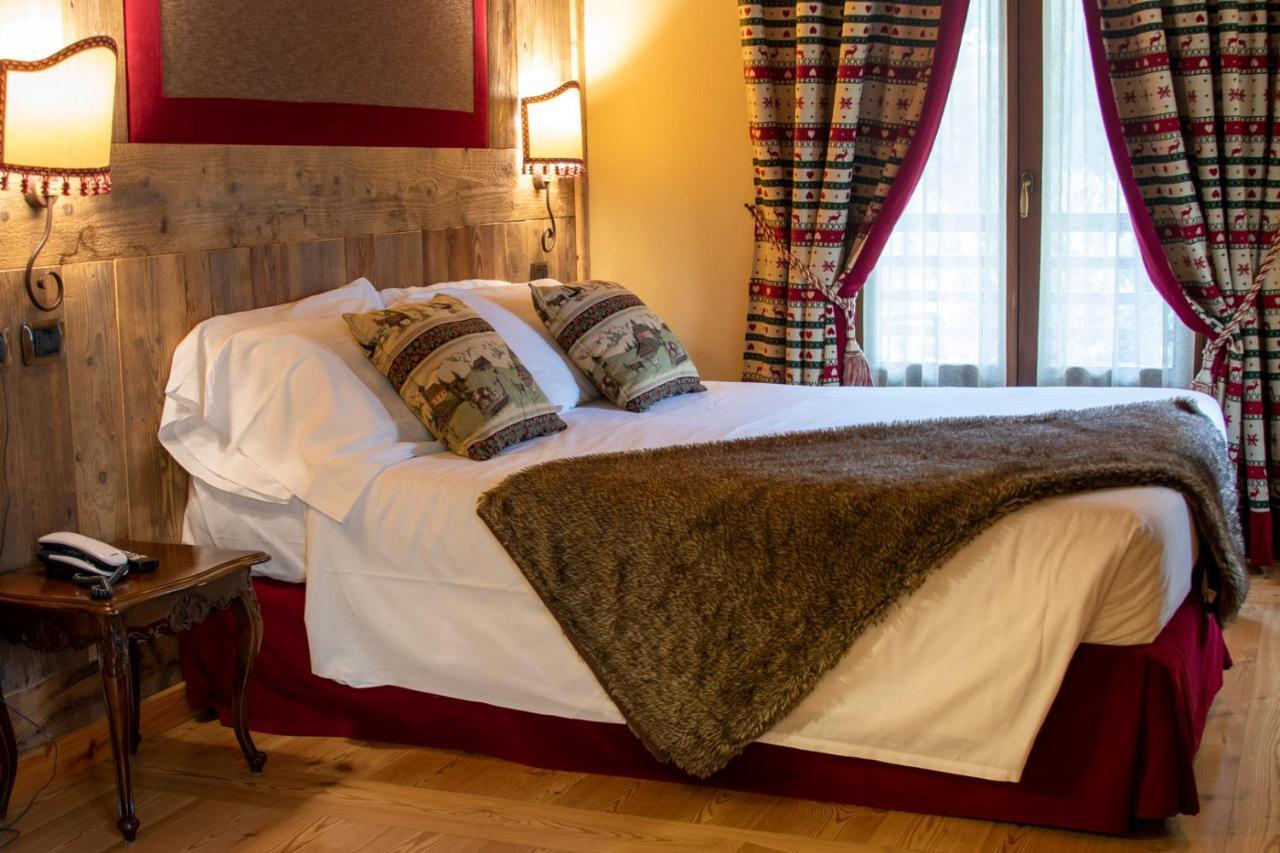 Laghetto Alpine Hotel & Restaurant Брюссон Экстерьер фото