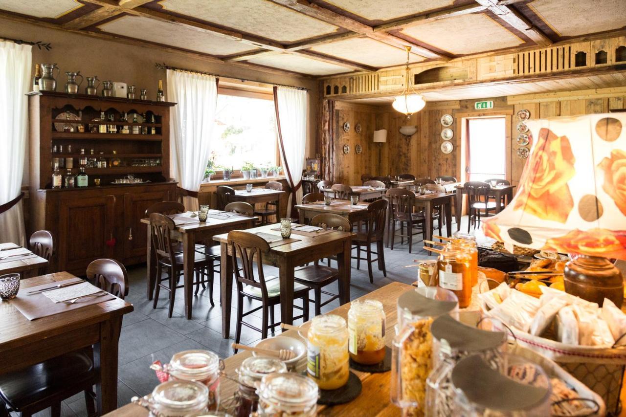 Laghetto Alpine Hotel & Restaurant Брюссон Экстерьер фото