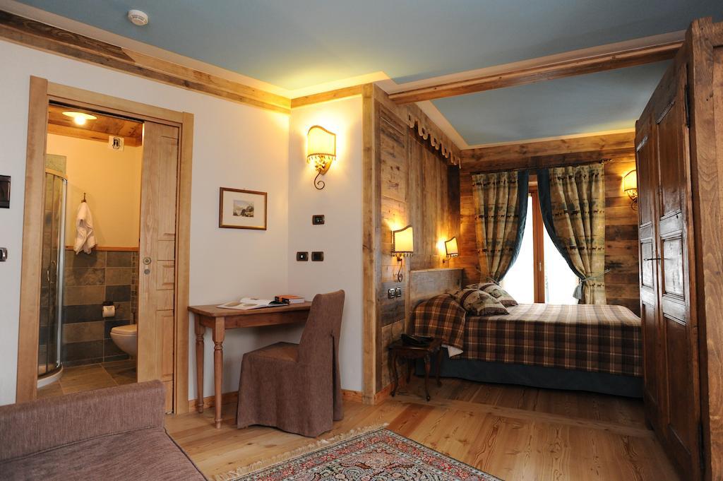 Laghetto Alpine Hotel & Restaurant Брюссон Экстерьер фото
